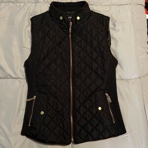 Women’s quilted black vest